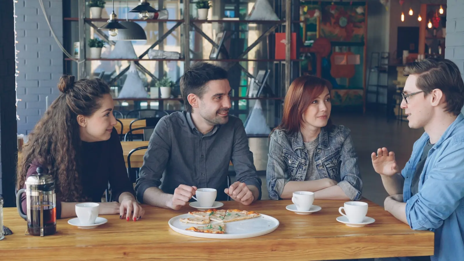 People sharing a meal around a table